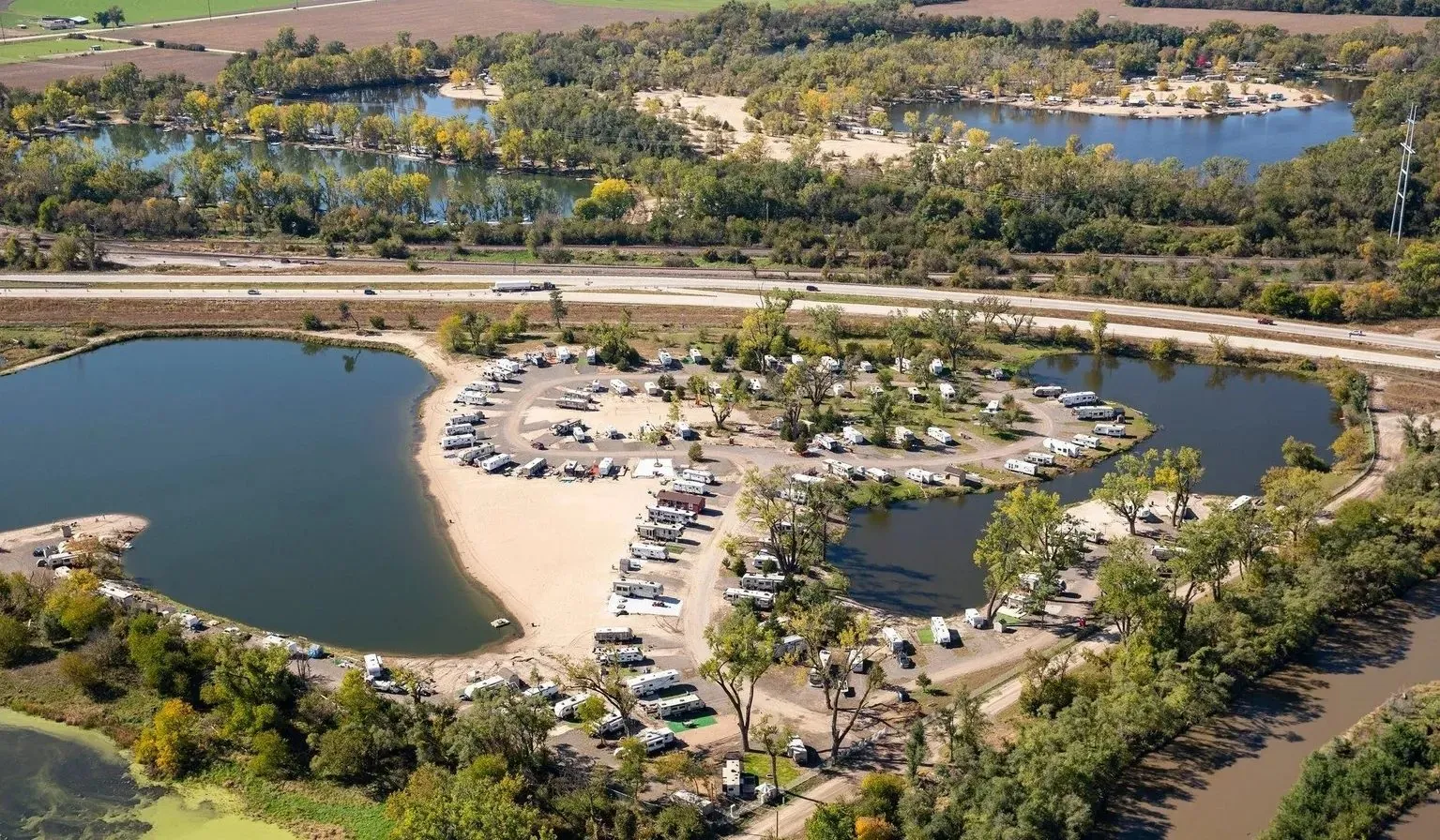 Aerial view of the lakes and campground at Merritt Beach RV Park