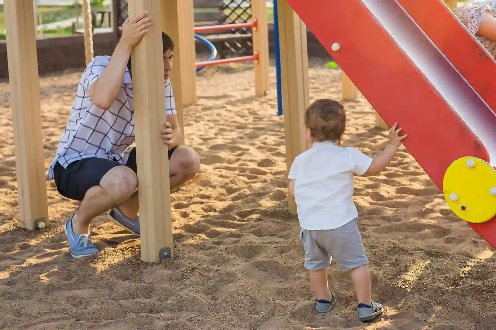 Children playing on playground equipment